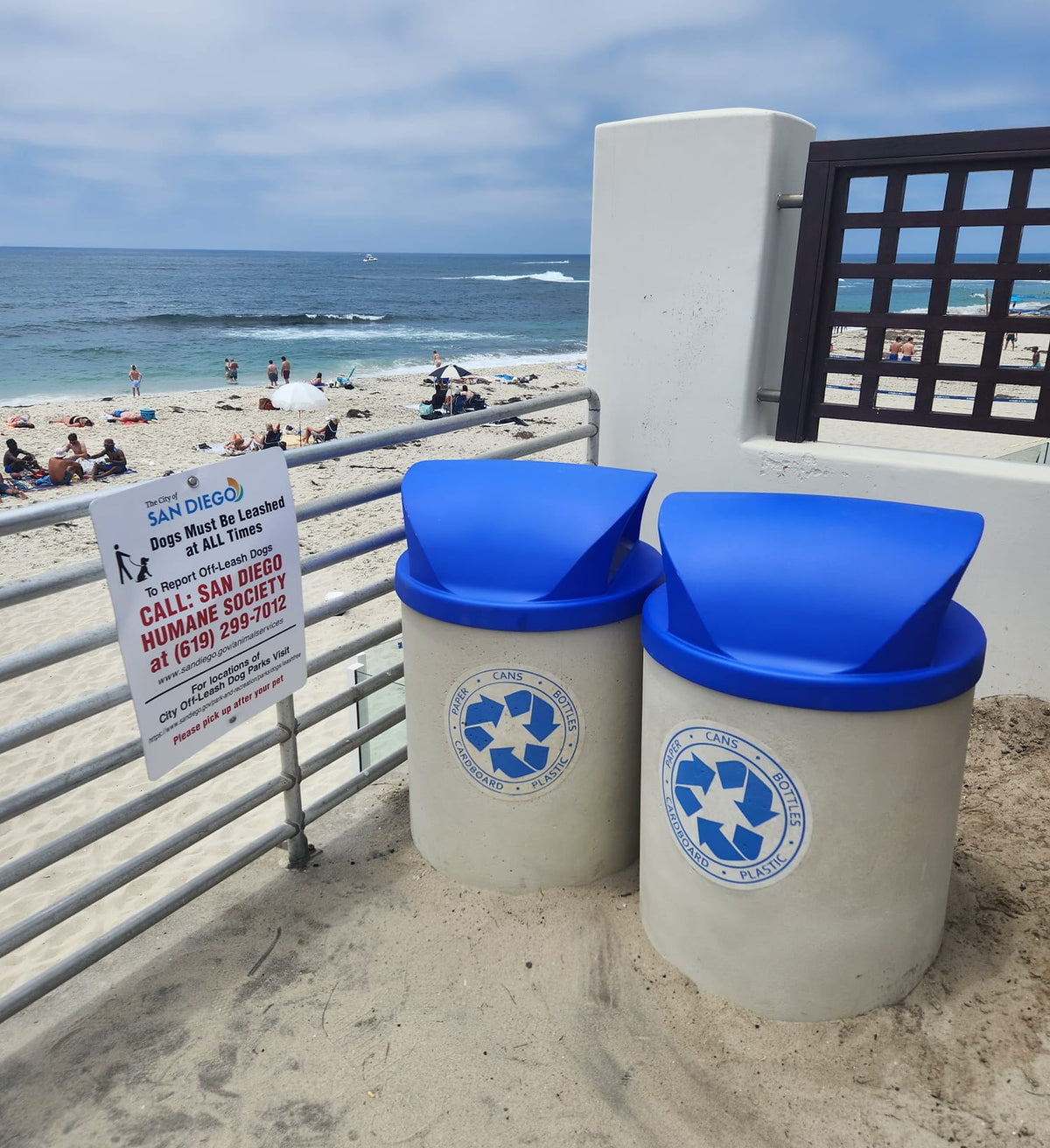 pure-design-werx-blue-lid-concrete-recycling-receptacles-beach-close-up