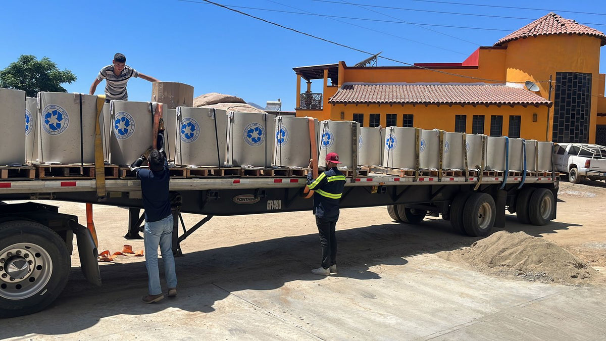 pure-design-werx-concrete-receptacles-truck-unloading