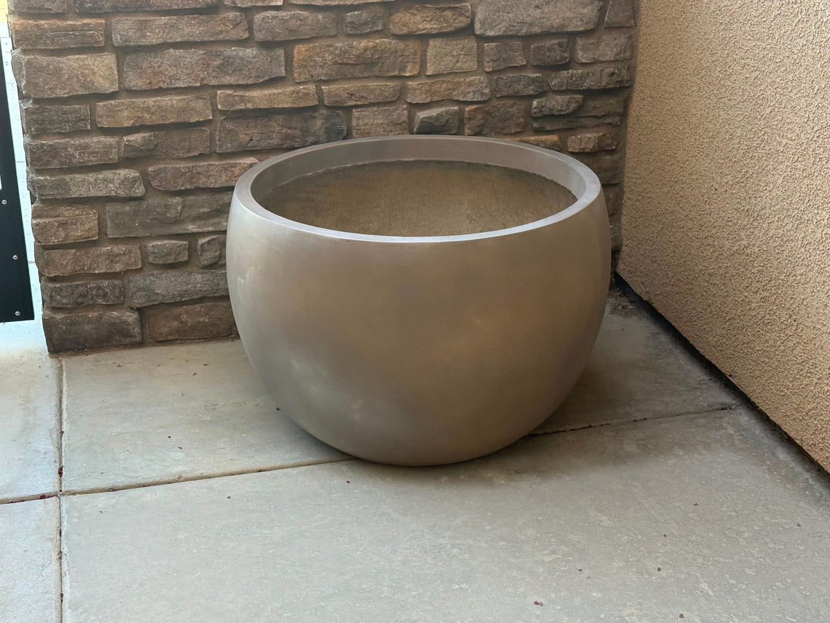pure-design-werx-round-beige-planter-stone-wall