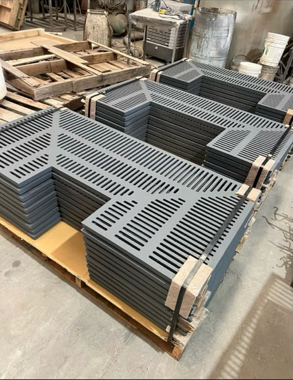 pure-design-werx-slotted-square-tree-grates-stacked-pallet