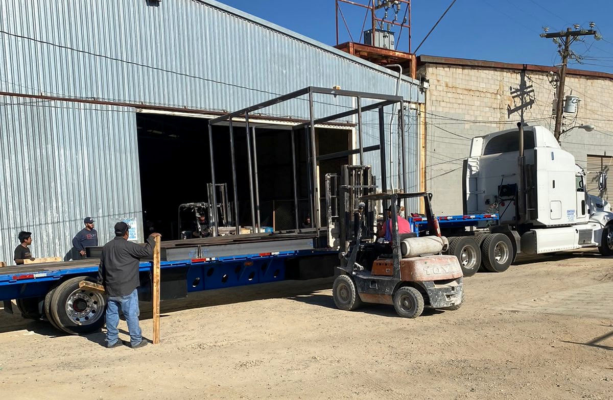 pure-design-werx-steel-frame-flatbed-truck-loading