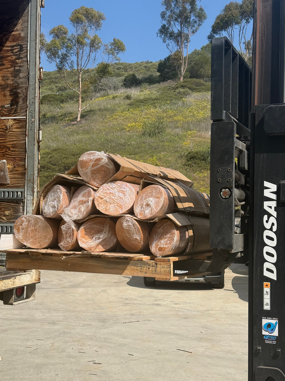 pure-design-werx-wrapped-metal-bollards-forklift-delivery